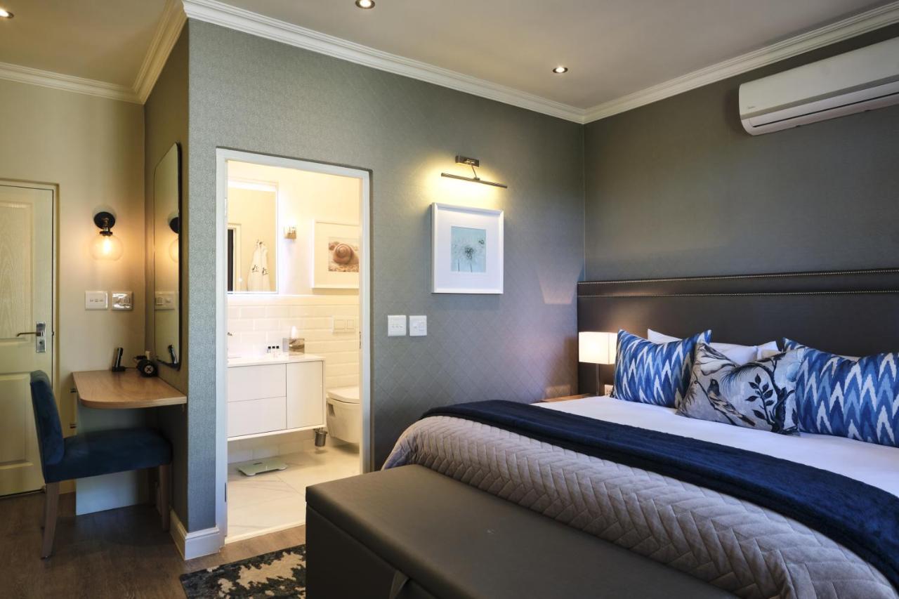 Alluvia Boutique Winery & Luxury Accommodation Stellenbosch Dış mekan fotoğraf A bedroom at the Oyster Box