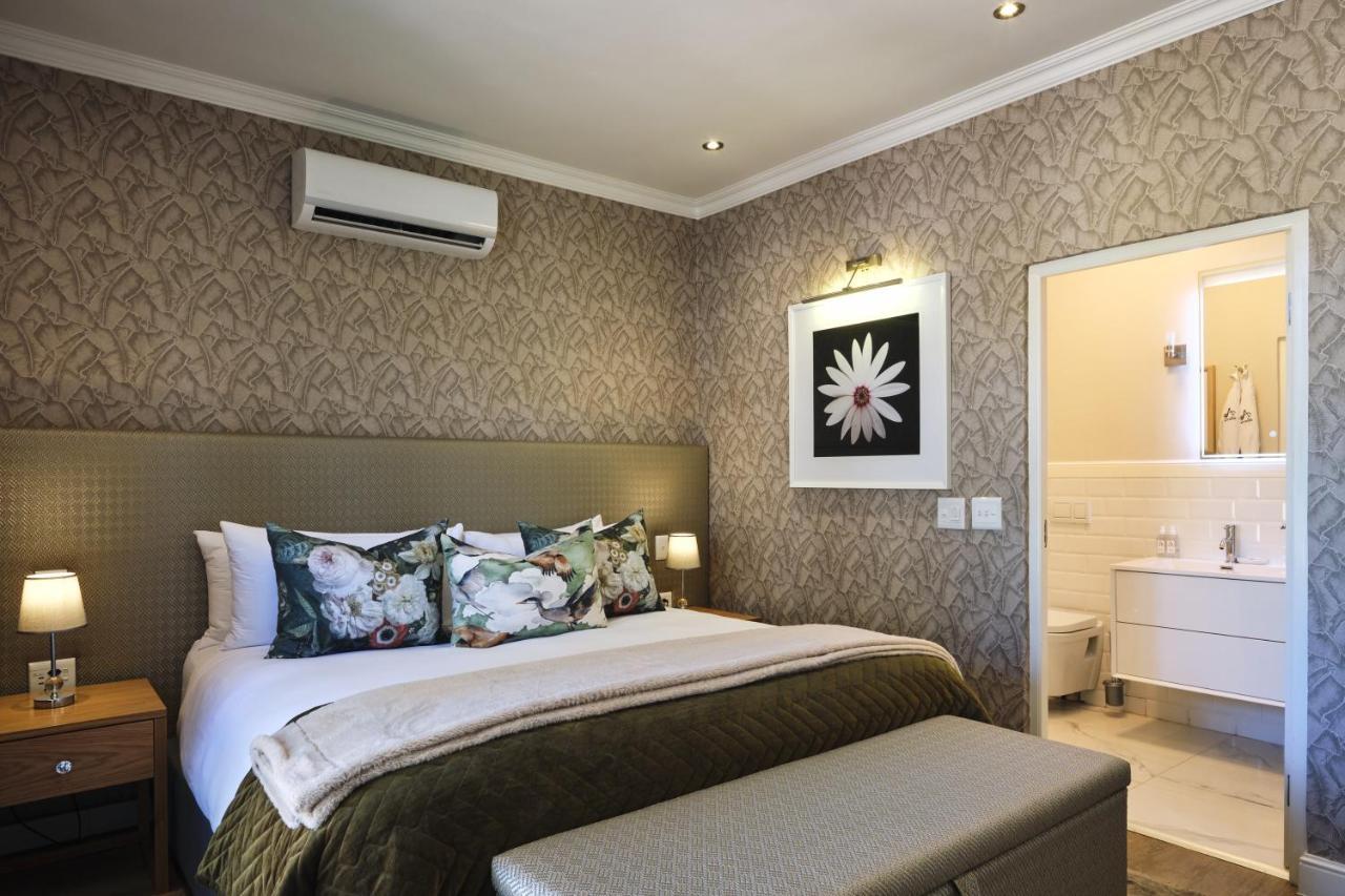 Alluvia Boutique Winery & Luxury Accommodation Stellenbosch Dış mekan fotoğraf A bedroom at the Cape Heritage